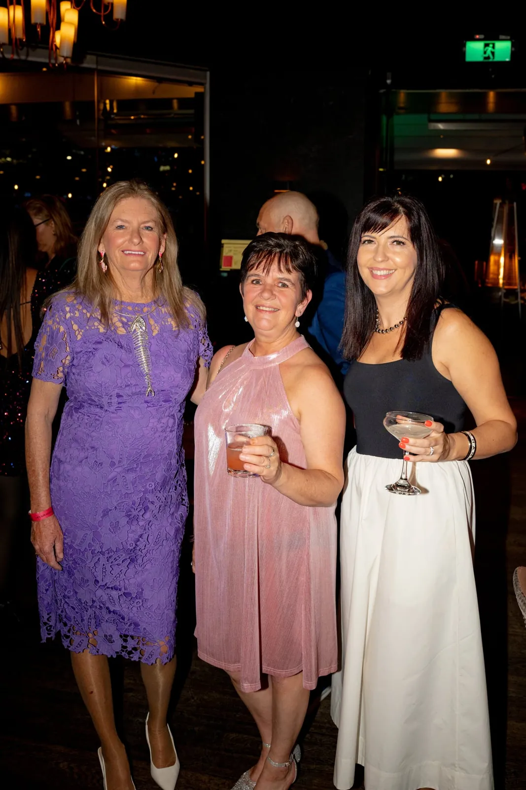 Three guests enjoying the Cocktail Party together