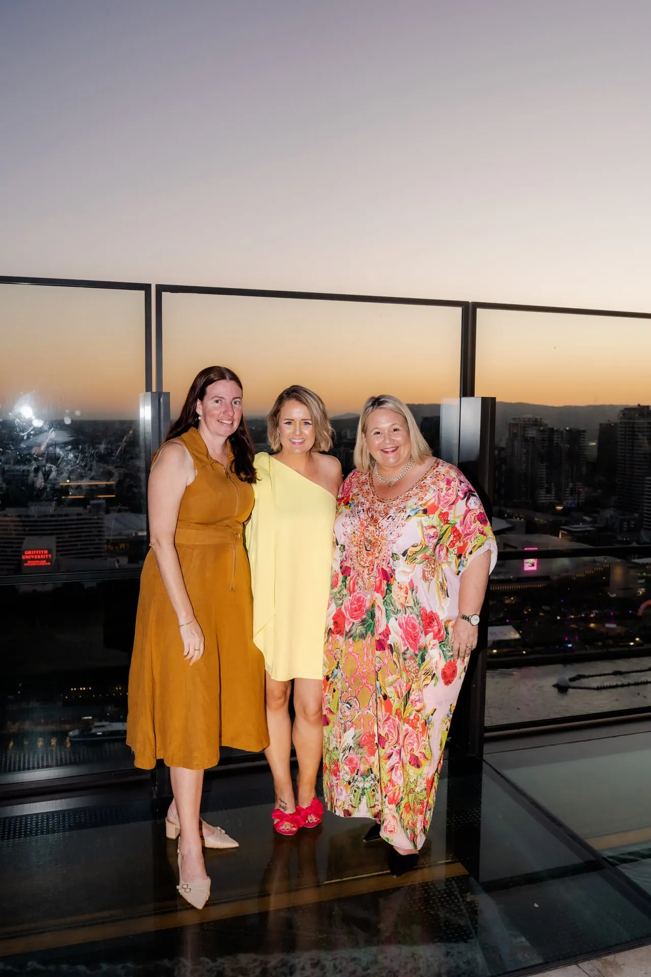 Three business owners together at a RAYE Haus evening event