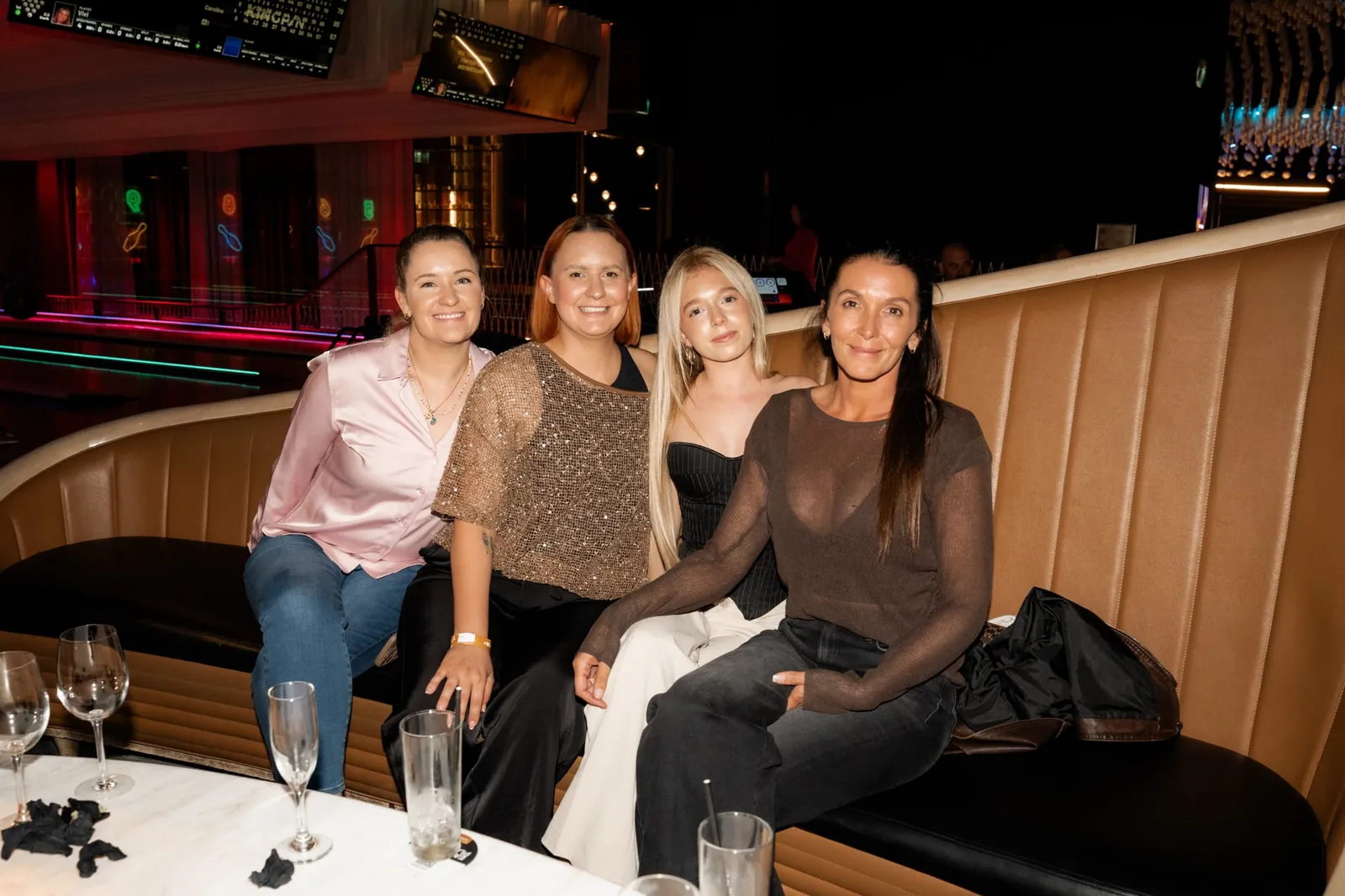 Four guests sharing a moment together at an event