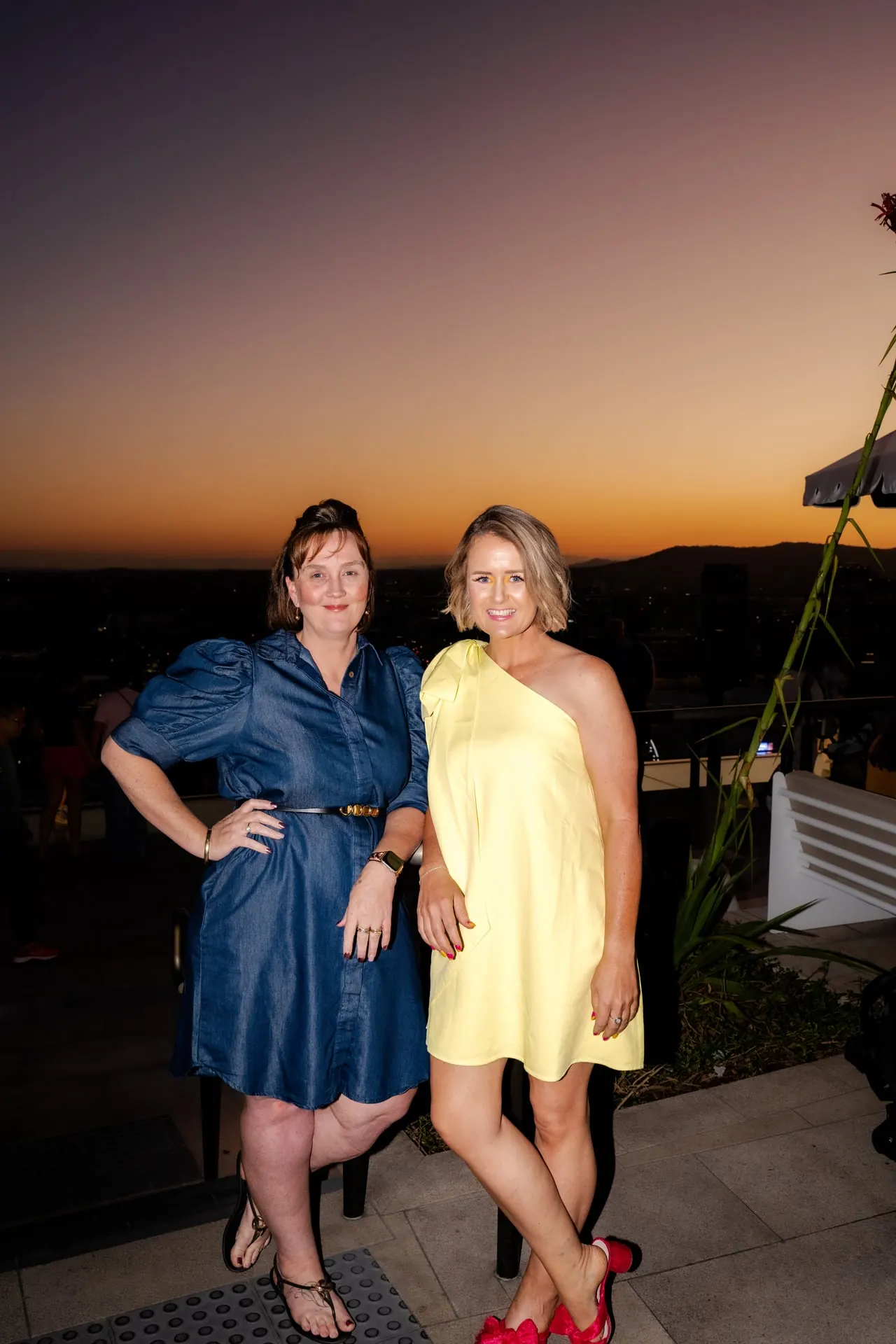 Two RAYE Haus members together at sunset