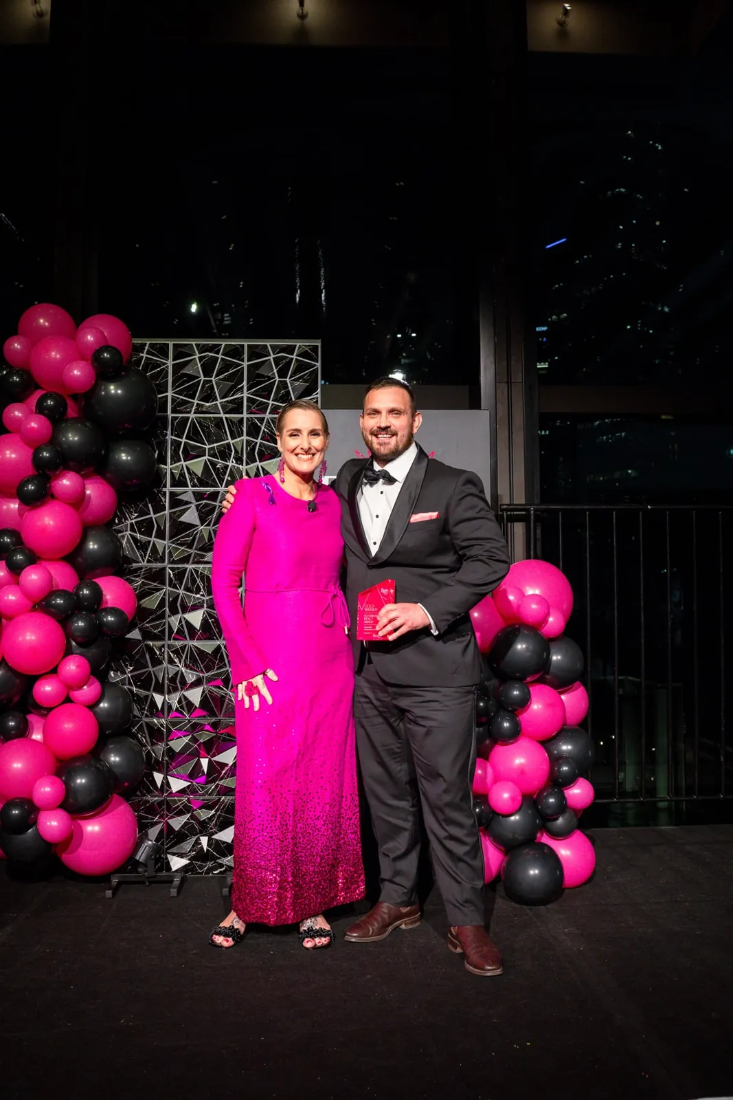 Two guests dressed for the Awards Gala